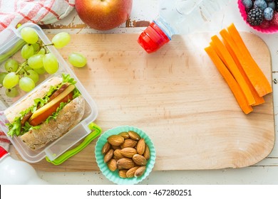 Making School Lunch On Wood Background