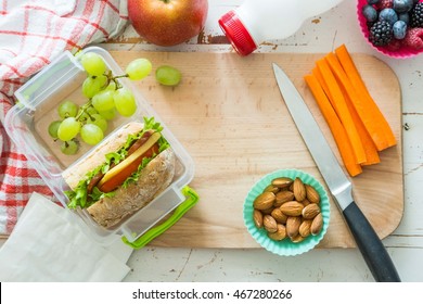 Making School Lunch On Wood Background