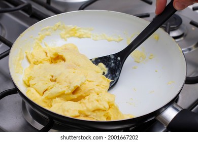 Making Scrambled Eggs In A Pan