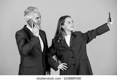 Making Selfie. Entrepreneurship. Business Discussion. Businessman Speak On Phone With Small Girl. Bearded Dad Dyed Hair. Kid Oversized Jacket. Business People Using Devices.