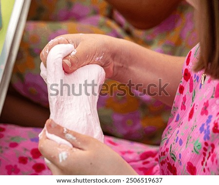making slime at a children's party, Slime - the fun, stretchy and colorful slime that brings so much joy to children, birthday parties