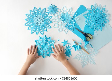 Making Of Snowflakes From Paper