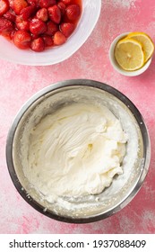 Making A Strawberry Parfait With Whipped Cream