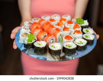 Making Sushi And Rolls At Home. Sushi With Seafood, Salad And White Rice. Food For Family And Friends. A Set Of Different Rolls And Sushi On A Tray.