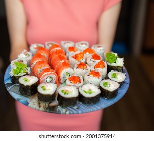 Making Sushi And Rolls At Home. Sushi With Seafood, Salad And White Rice. Food For Family And Friends. A Set Of Different Rolls And Sushi On A Tray.