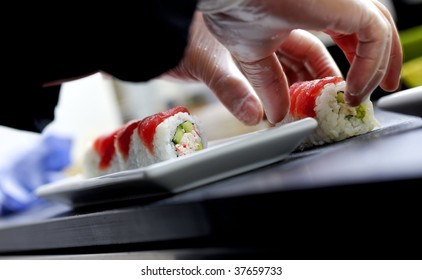 Making Sushi And Rolls On Plate