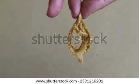 Making sweets. Shabakia in hand. Chebakia marocaine Before cooking candies Ramadan In Morocco