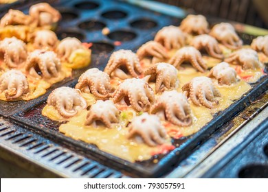 Making Takoyaki by big squid Floating market.