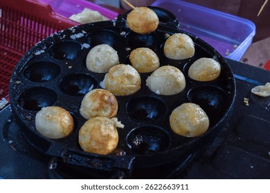 The making of takoyaki street food Indonesian style