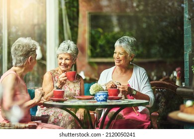 Making time to catch up with good old friends. Cropped shot of a group of senior female friends enjoying a lunch date. - Powered by Shutterstock