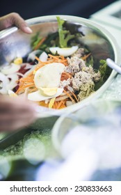 Making Tuna Salad In Metal Bowl