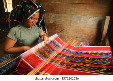 The Making Of Ulos (Ulos is Signatured Textile of Batak Culture) in Lumban Suhi-suhi Samosir Island, Lake Toba, North Sumatra, Indonesia. April 24, 2017