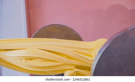 Making Yellow Salt Water Taffy In Small Candy Shop.