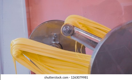 Making Yellow Salt Water Taffy In Small Candy Shop.