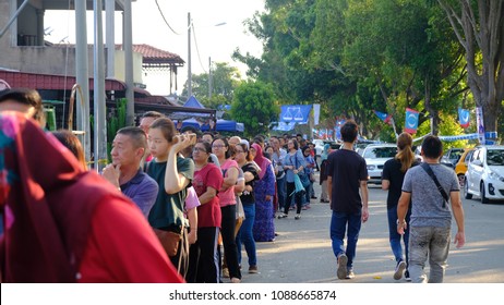 Malacca, Malaysia: 09/05/2018; Crowds Queuiup Patiently In Malacca, Malaysia To Cast Tbeir Votes During 14th Malaysian General Election Day.