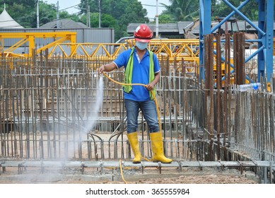 MALACCA, MALAYSIA â?? JUNE 26,  2015: Construction Workers Spraying The Anti Termite Chemical Treatment At The Construction Site 