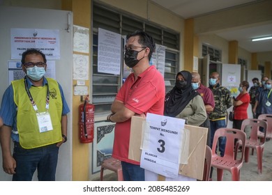 MALACCA, MALAYSIA : NOVEMBER 20, 2021 - Voters Line Up At The Polling Station In Melaka