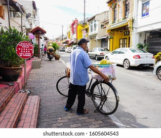 Malacca, Malaysia - Oct 4, 2014. People On Street In Malacca, Malaysia. Malacca (Melaka) Was Listed As A UNESCO World Heritage Site Together With George Town On 2008.