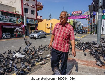 Malacca, Malaysia - Oct 4, 2014. People On Street In Malacca, Malaysia. Malacca (Melaka) Was Listed As A UNESCO World Heritage Site Together With George Town On 2008.