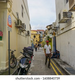 Malacca, Malaysia - Oct 4, 2014. People On Street In Malacca, Malaysia. Malacca (Melaka) Was Listed As A UNESCO World Heritage Site Together With George Town On 2008.