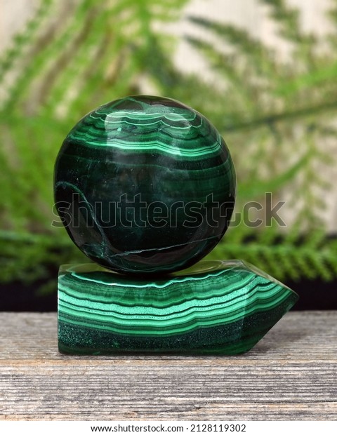Malachite crystal tower and Malachite sphere for\
crystal healing, health and\
wellness