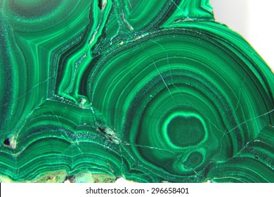 Malachite in front of white background, carbonate with the chemical formula Cu2 [(OH) 2 | CO3]