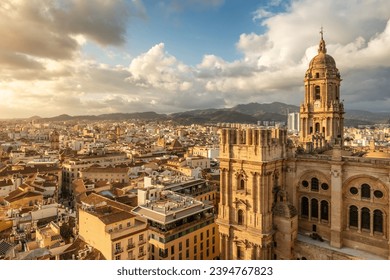 Malaga cityscape with beautiful Cathedral of the incarnation at sunset, Spain. Malaga old town, Cathedral and skyline of the city. - Powered by Shutterstock