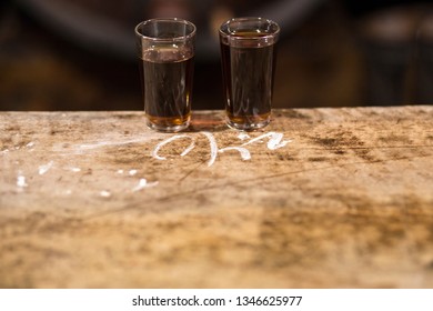 Malaga Sweet Wine Tavern With Chalked Bill On Counter. Old Traditional Wine Tavern