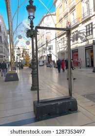 Malaga/Spain - 01-17-2019 : Empty Advertising Billboard With No Poster. We Can See Through The Frame. Photo Taken In A Busy Pedestrian Street, Sunny Day.