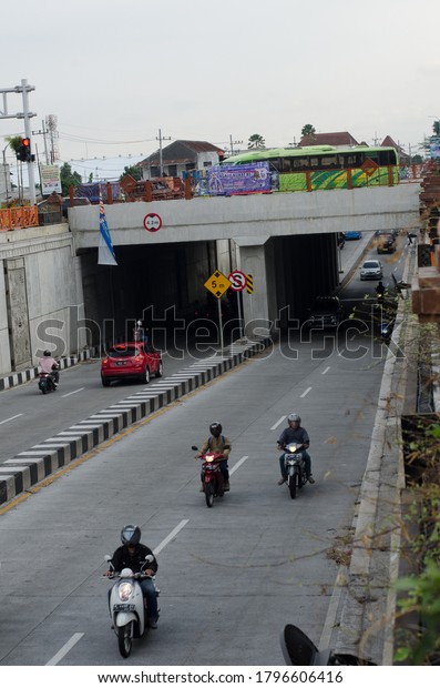 MALANG, EAST JAVA/INDONESIA - AUGUST 13 2020:
Underpass in Malang with many
vehicles