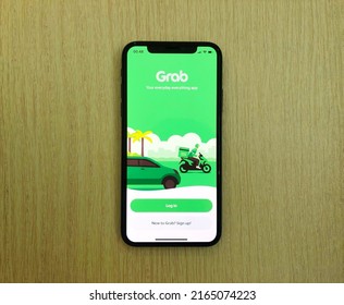 Malang, Indonesia - Jun 4th 2022: Grab App On Smartphone Screen. Grab Is A Taxi-hailing App, And Has Expanded Its Product To Include Vehicle-hailing, Food, Grocery And Package Delivery.