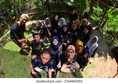 MALANG, INDONESIA - NOVEMBER 03, 2018: A Group People Are Taking Selfie Together Using Fish Eye Lens Ar Hotel Park In Malang, Indonesia.