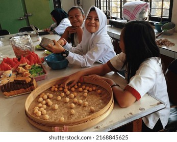Malang, Indonesia - October 13, 2015: Vocational School Students Made Traditional Indonesian Cakes.