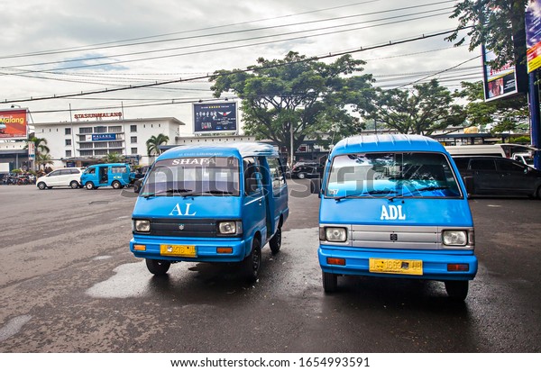 Malang, Indonesia : Public transportation that\
serves trips within the city in Malang City, East Java Province.\
This public transportation is commonly referred to as city\
transportation\
(02-2020).