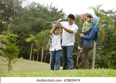 Malay Family Having Fun At The Park