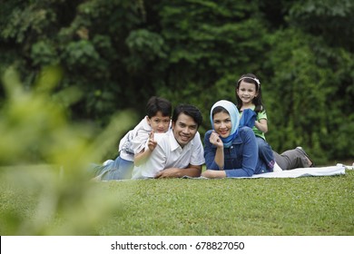 Malay Family Having Fun At The Park