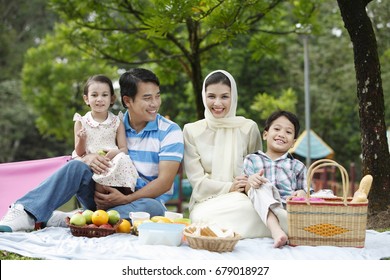 Malay Family Having Fun At The Park