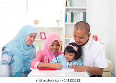 Malay Family Learning Together Lifestyle Background Stock Photo (Edit ...