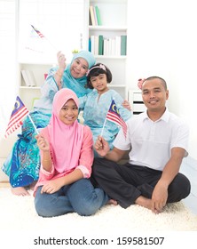 Malay Family With Malaysian Flag Lifestyle Photo