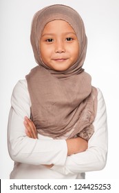 A Malay Little Girl Wearing Head Scarf As An Islamic Attire