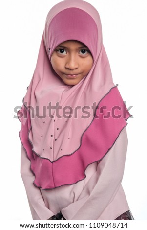 A malay muslim girl wearing hijab isolated on white background