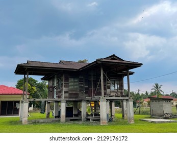 Malay Traditional House On Grass