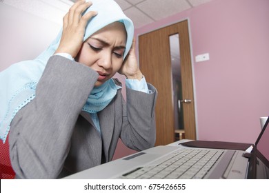 Malay Woman Having Stress While Working.