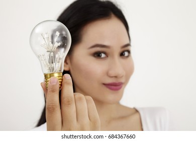 Malay Woman Holding Light Bulb