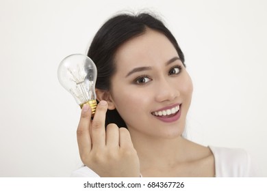 Malay Woman Holding Light Bulb