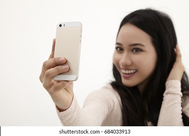 Malay Woman Selfie On The White Background