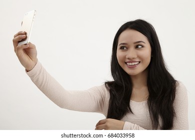 Malay Woman Selfie On The White Background