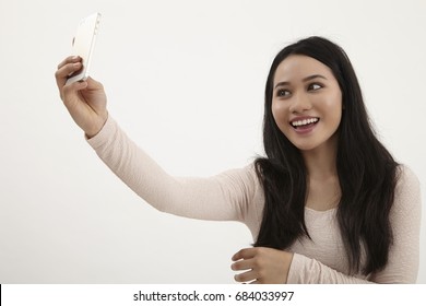 Malay Woman Selfie On The White Background