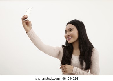 Malay Woman Selfie On The White Background