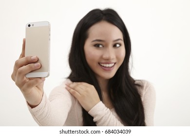 Malay Woman Selfie On The White Background